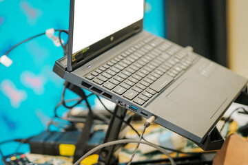 laptop or ultrabook mounted on a portable holder stand
