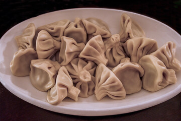 khinkali on a plate, georgian cuisine, Tbilisi, Georgia