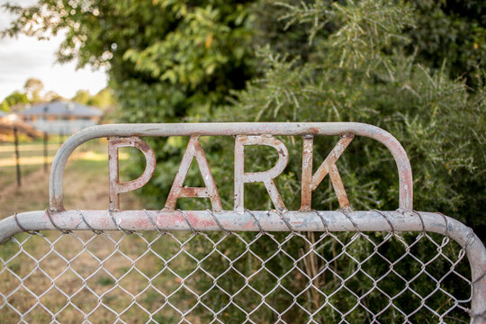 Iron Park Gate with bushy background
