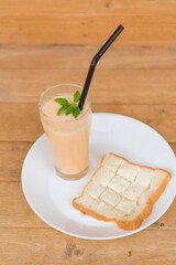 Milk melon Smoothie in glass with Roast bread