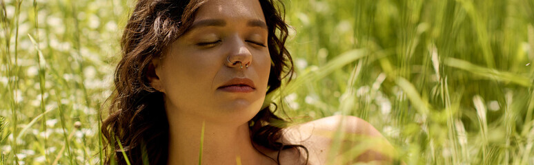 Sunny summer day with a young woman in a white dress enjoying nature's beauty