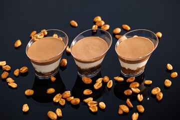 Tasty sweet dessert. Verin snickers chocolate sponge cake, salted caramel, caramelized peanuts,...