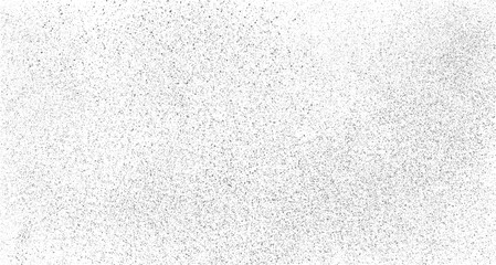 Grainy dust texture background. Abstract black and white speckle surface with grunge noise effect. Dirty film grain overlay for vintage design.
