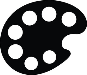 Fototapeta premium Solid black painting palette with several white circles displayed on a white background