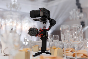 Professional videographer's camera for wedding photography.