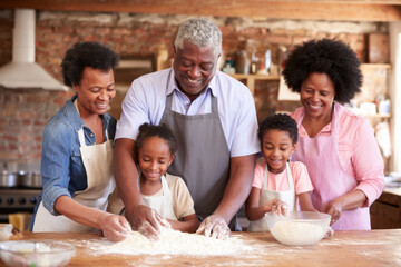 A joyful multigenerational family bakes together, sharing smiles and flour in a warm kitchen setting.
