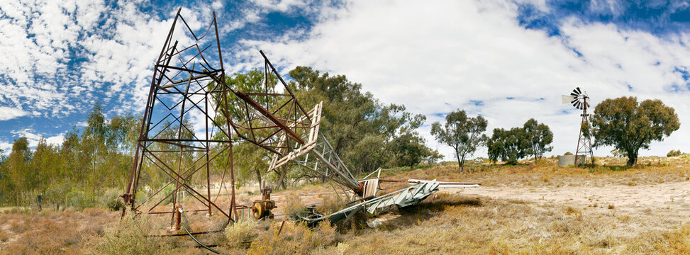 A broken windmill lying on the ground