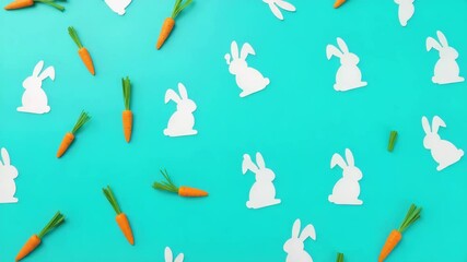 Easter-themed blue background with white rabbit cutouts and small orange carrots