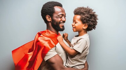 Father's Superhero Embrace: A heartwarming scene of a father, adorned with a superhero cape, embracing his smiling child, embodying strength, protection, and unconditional love.
