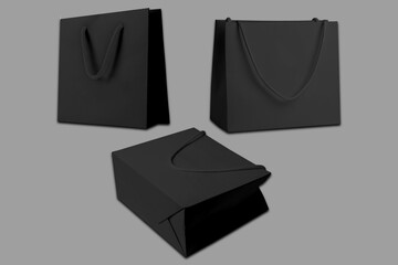 Recycled Matte black paper kraft shopping bag mockup isolated on grey background. 3d rendering.