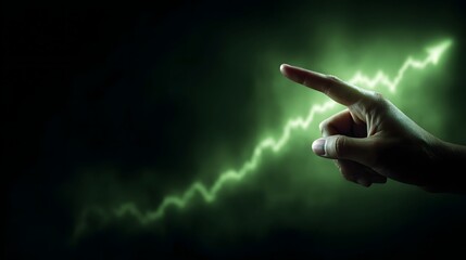 Naklejka premium Hand pointing at rising investment chart