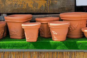 Old empty ceramic flower pots outside in countryside
