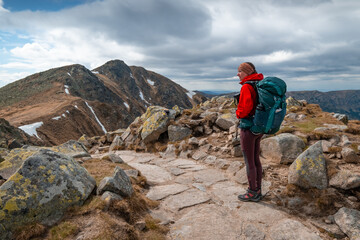 Woman with a backpack in the Low Tatras mountains in Slovakia