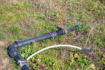 pipe for water supply for drip irrigation on an agricultural farm. Irrigation installation