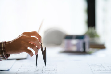 Interior architecture or engineer working on blueprint and planning projects
