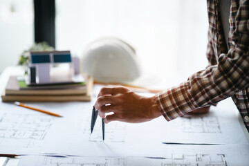 Interior architecture or engineer working on blueprint and planning projects