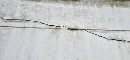 Cracks in old cement wall were visible as wide crack fissures. This may be due to mismatch of...