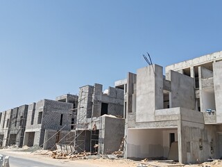 Under Construction House Or Villa's With Concreate Block Or Bricks.
Exterior View 02 Story luxurious Modern Design House architecture.
InComplete residential Villa Structure with Erected Scaffolding.
