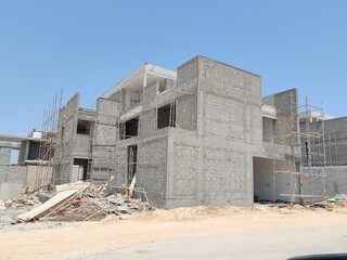 Under Construction House Or Villa's With Concreate Block Or Bricks.
Exterior View 02 Story luxurious Modern Design House architecture.
InComplete residential Villa Structure with Erected Scaffolding.