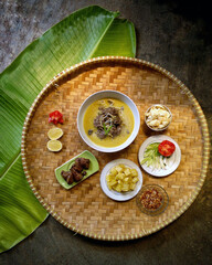 Betawi soto dish on a Wicker Tray