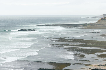 Rolling Ocean Waves on the Coastal Shores of Portugal