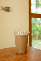 Coffee in a plastic cup to take home