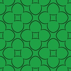 Naklejka premium A repeating floral pattern composed of green shapes creates a symmetrical design, with four-leaf clover-like motifs connected seamlessly. 
