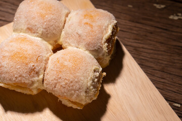 Modern bakery with many ingredients such as wheat flour, sugar, eggs, grains, fruit, butter, milk.