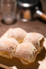 Modern bakery with many ingredients such as wheat flour, sugar, eggs, grains, fruit, butter, milk.