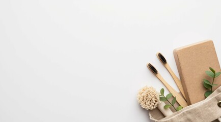 Eco-friendly bath items in a canvas bag on a white background