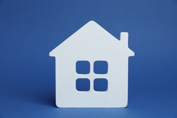 One white house model on blue background