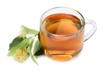 Tasty linden tea in cup, leaves and flowers isolated on white