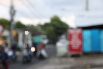 Blurred view of cars and buildings in city