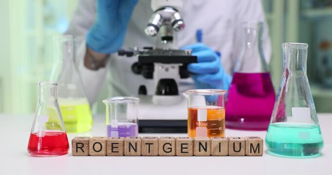 A laboratory scene vividly showcasing a microscope alongside an array of various colorful chemical solutions
