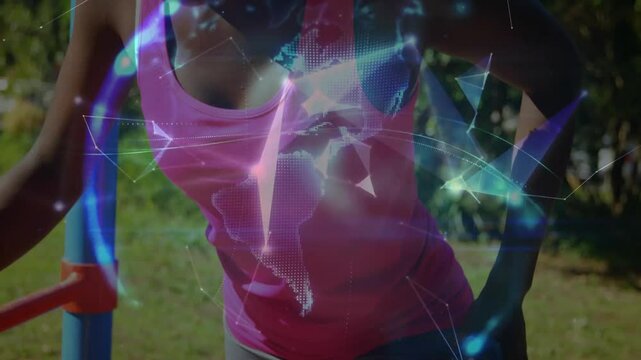 Woman bracing bar lifting fitness dumbbell while side bending evolving digital polygons into globe