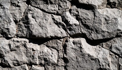 Raw gray stone with natural pores and cracks. A clean, tactile background for earthy product...