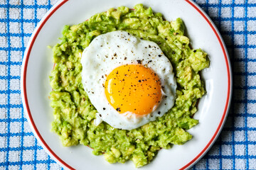 Healthy Fried Egg On Mashed Avocado Meal