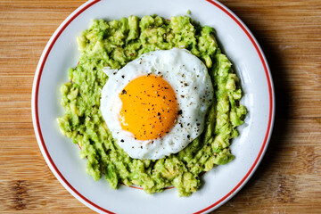 Healthy Fried Egg On Mashed Avocado Meal