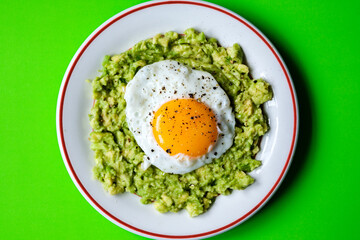 Healthy Fried Egg On Mashed Avocado Meal