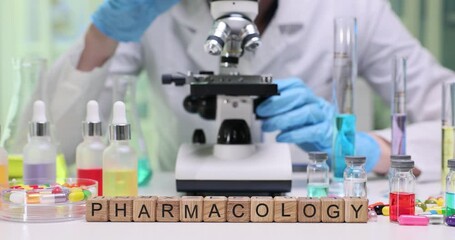 Exploring pharmacology in a lab with a microscope and colorful chemicals for thorough research and analysis