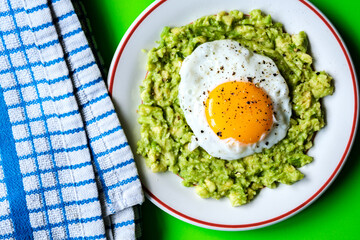 Healthy Fried Egg On Mashed Avocado Meal