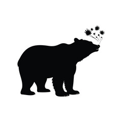 Fototapeta premium Silhouette of a bear smelling flowers blowing out from its nose