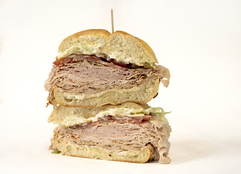 Turkey and Cheese Sandwich on a white background