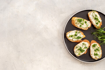 Sandwiches with fresh sprouting microgreens. Sprouted peas seeds micro greens. Vegan food