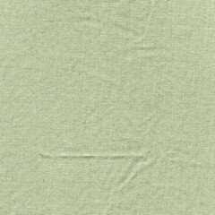 Light green fabric texture with soft wrinkles and natural fiber grain, ideal for backgrounds, textile design, packaging, scrapbooking, and clean, organic-themed graphic projects.