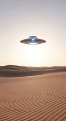 Futuristic flying saucer hovering above desert sand dunes. Unidentified object concept of alien landing or extraterrestrial visit. Mysterious desert landscape.