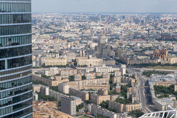 View of Moscow Cityscape Showcasing Urban Architecture and Greenery From a High Vantage Point on a Clear Day