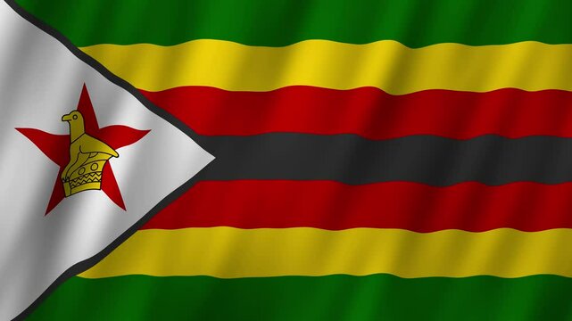 Zimbabwe flag waving proudly under clear blue sky
