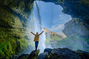 Discovering the beauty of Kvernufoss waterfall in Iceland during a vibrant sunset