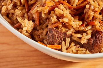 A bowl of plov, the Uzbek meat and rice dish